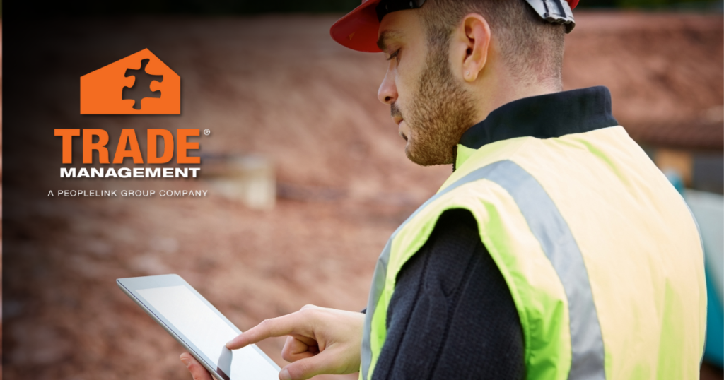 Skilled tradesman using a tablet.