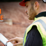 Skilled tradesman using a tablet.