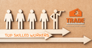 Illustration of wooden cutout figures standing on arrows, with one figure using a telescope. Text reads "Top Skilled Workers." Trade Management logo appears in the top right corner.